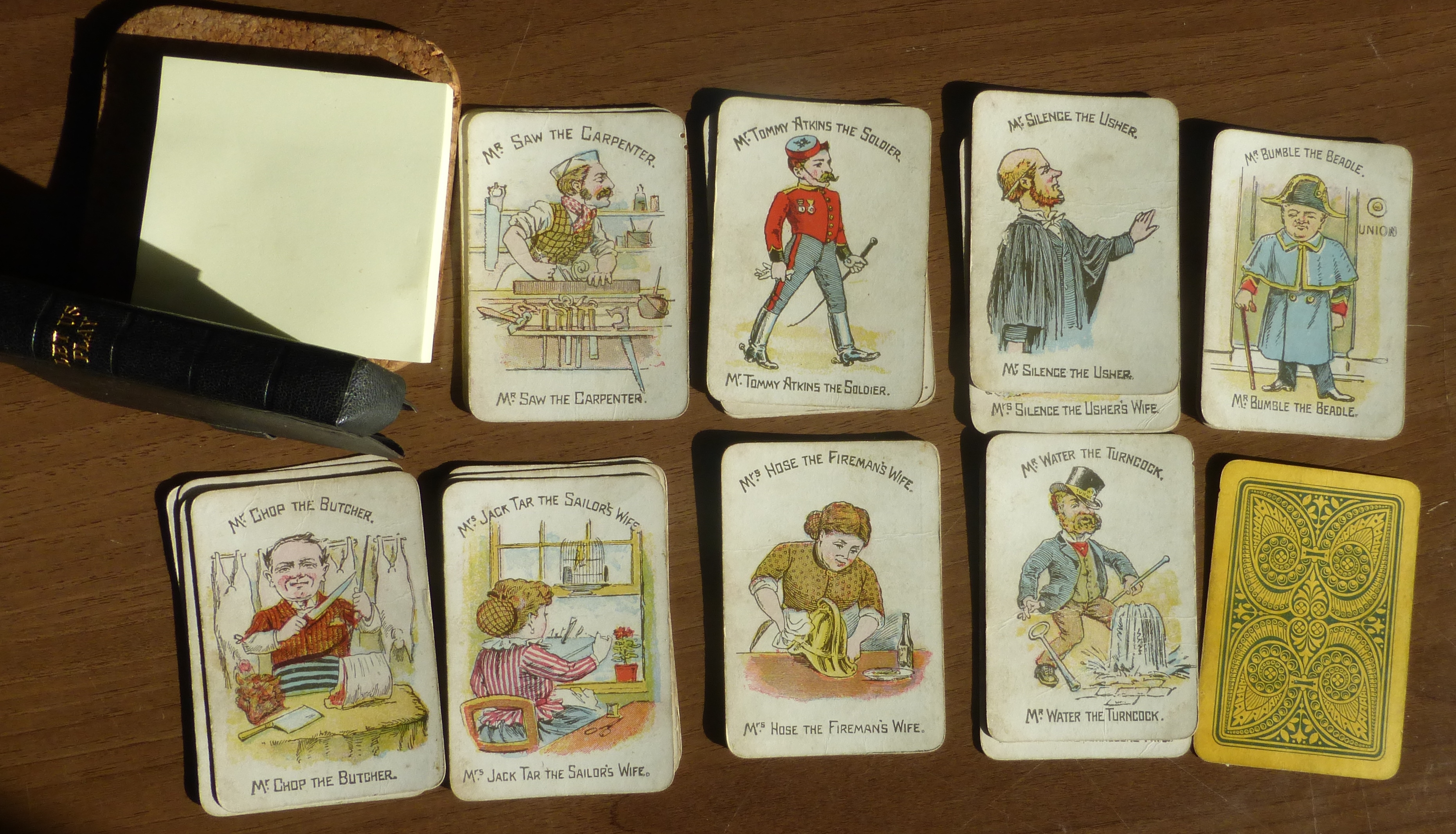 A c.1900 card game of FUNNY FAMILIES Glevum series by Woolley & Co.